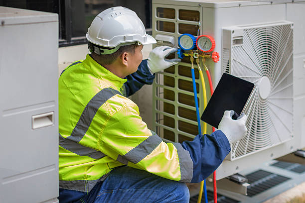 Professional Hvac Maintenance technician working in Indian Lake Estates, FL